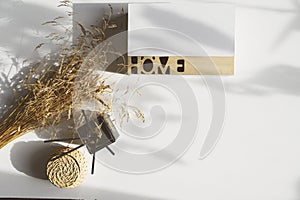 Aesthetic minimalist home. Fragrance diffusor, dried flowers and box