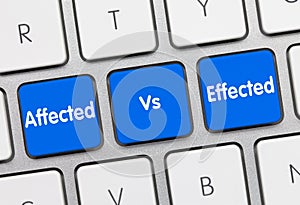 Affected Vs. Effected - Inscription on Blue Keyboard Key