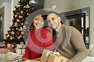 Affectionate couple ready for Christmas