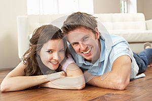 Affectionate Couple Relaxing At Home Together photo