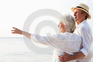 Affectionate Senior Couple On Tropical Beach Holiday