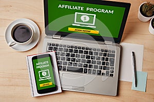 Affiliate program concept on laptop and smartphone screen