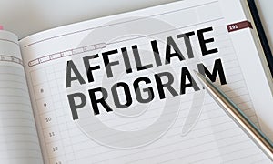 Affiliate Program text on notepad, concept background