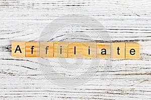 AFFILIATE word made with wooden blocks concept