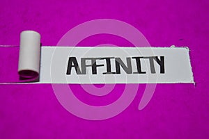 Affinity text, Inspiration and positive vibes concept on purple torn paper