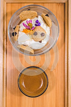 Affogato with expresso and vanilla ice cream and edible flowers