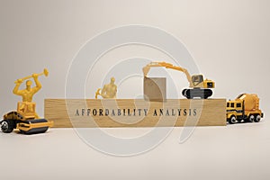 affordability analysis written on wooden surface. Finance and mortgage