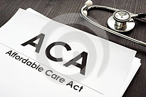 Affordable Care Act ACA and stethoscope on a desk