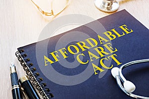 Affordable Care Act ACA on a table. photo