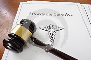 Affordable Care Act and judge`s gavel photo