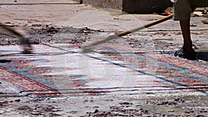 Afghan carpets being cleaned