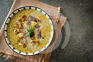 Afghani chicken in green curry or Hariyali tikka chicken hara masala