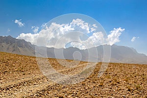 Afghanistan landscape, desert plain against the backdrop of mountains