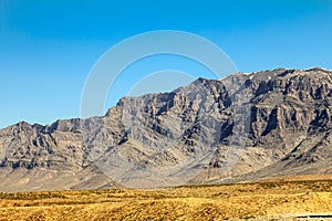 Afghanistan landscape, desert plain against the backdrop of mountains