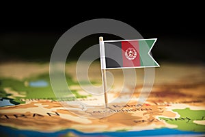 Afghanistan marked with a flag on the map