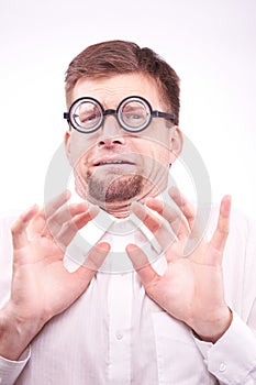 Afraid man in glasses