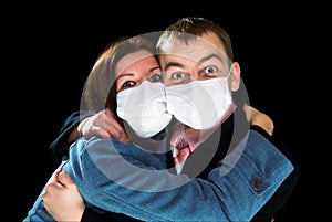 Afraid man and woman dressings mask