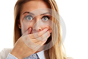 Afraid woman looking at camera isolated on a white background