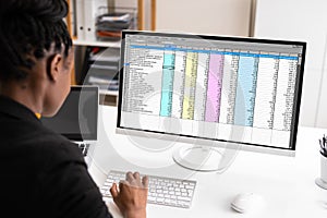 African American Auditor Using Electronic Spreadsheet photo