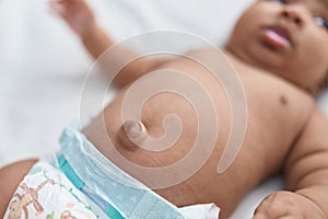 African american baby belly button at bedroom