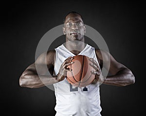 African American Basketball Player portrait holding a ball