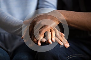 African american black couple husband and wife holding hands, cl