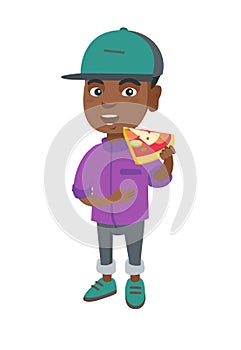 African-american boy eating tasty pizza.