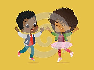 African American Boy and girl are playing together happily. Kids Play at the grass. The concept is fun and vibrant