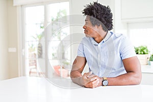 African American business man looking to side, relax profile pose with natural face with confident smile