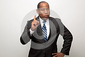 African American Business Man Pointing with Finger in Signal of Advice and Warning