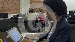 African american business woman typing using laptop computer businesspeople