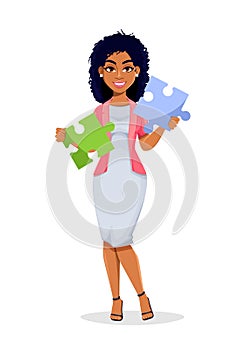 African American business womanAfrican American business woman holding two pieces of puzzle.