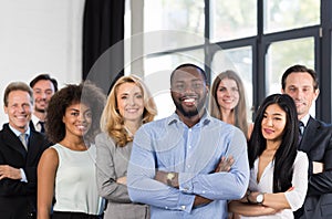 African American Businessman Boss With Group Of Business People In Creative Office, Successful Mix Race Man Leading