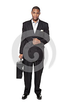 African American businessman holding briefcase