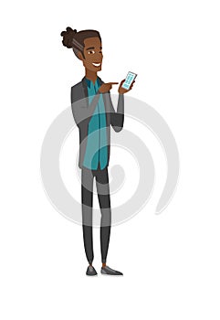African-american businessman holding mobile phone.