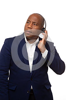 African American Businessman Listens Through Headset