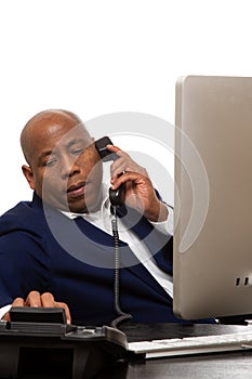 African American Businessman Listens On Phone