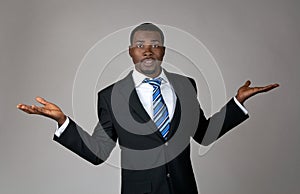 African American businessman looking puzzled