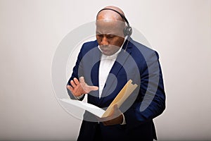 African American Businessman Looks Through File