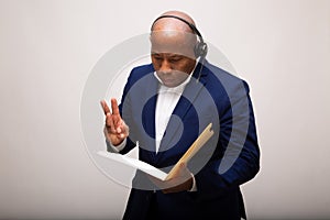 African American Businessman Looks Through File