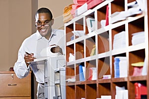 African American businessman reading document