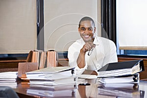 African American businessman reading documents
