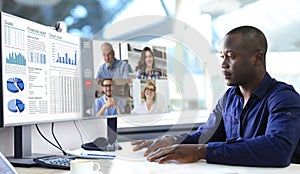 African american businessman talking to his colleagues in video conference. Multiethnic business team