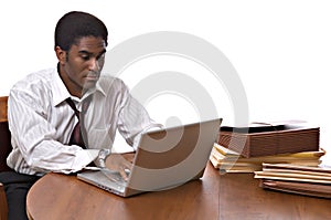 African-American businessman working on laptop