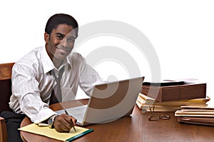 African-American businessman working on laptop
