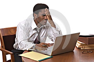 African-American businessman working on laptop