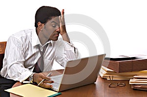 African-American businessman working on laptop