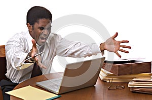 African-American businessman working on laptop