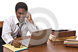 African-American businessman working on laptop