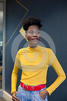 African american businesswoman contemplating while looking away at modern workplace